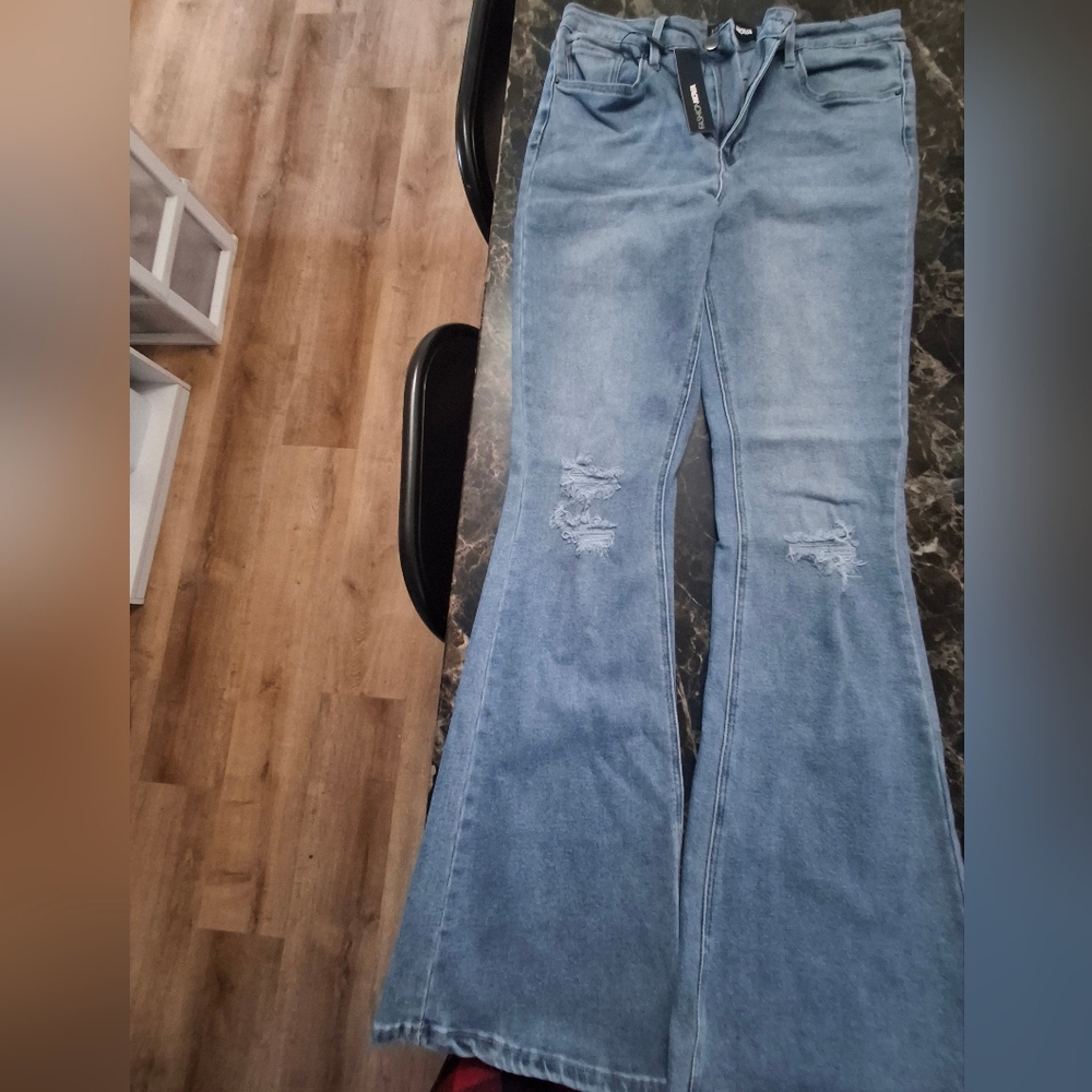 Fashion Nova Light Blue Distressed Flare Jeans